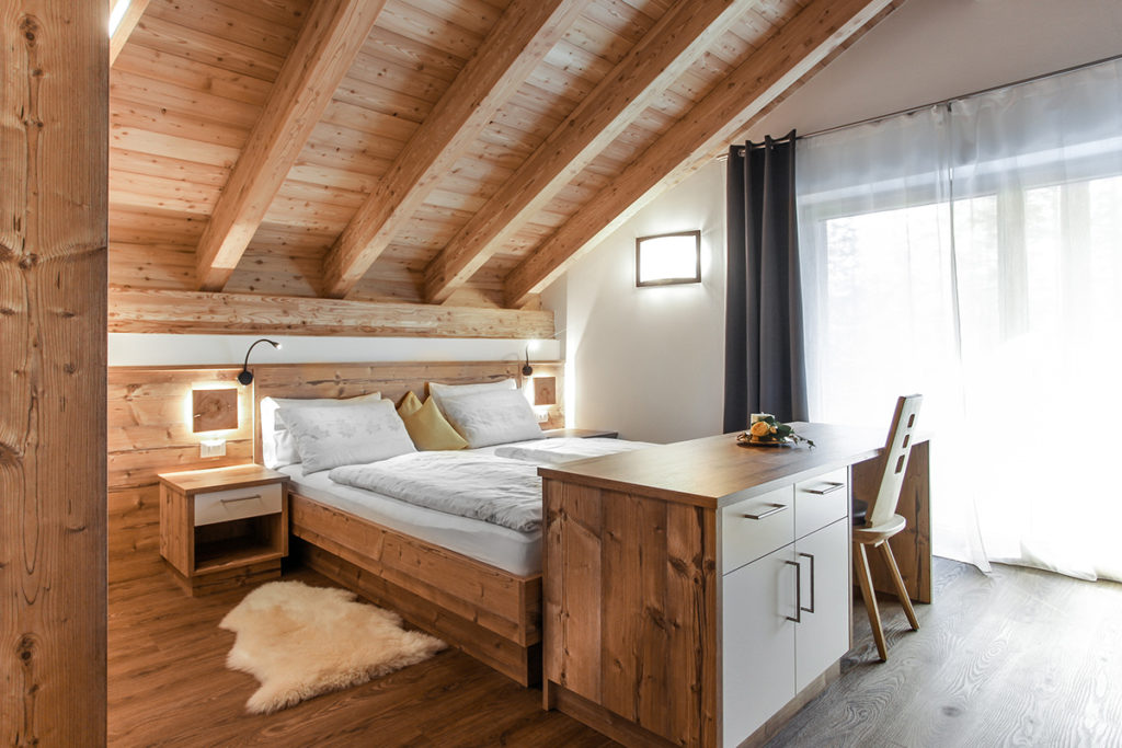 Wood - Appartement Ladinia Schlafzimmer in St. Kassian in Südtirol